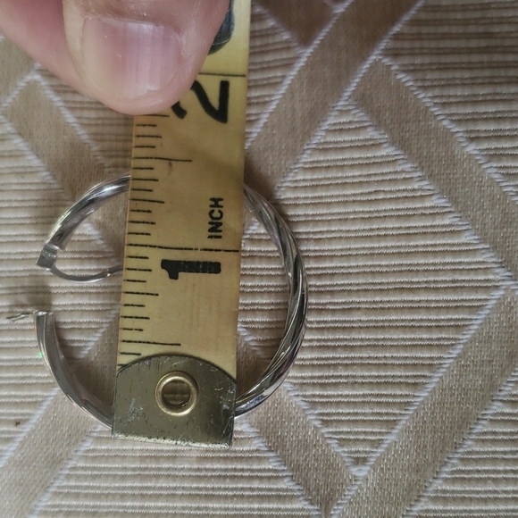 One Italian 14 karat gold white gold earrings from Costco . - Picture 3 of 6